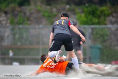 Titans Craig Batiste slides into 3rd with Spartans baseman Danny Penney